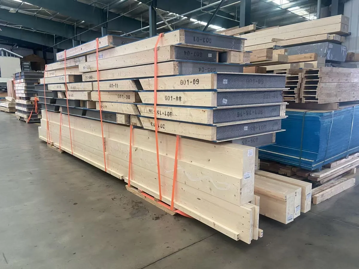 Strapped SIP panel package with visible panel references in the factory.