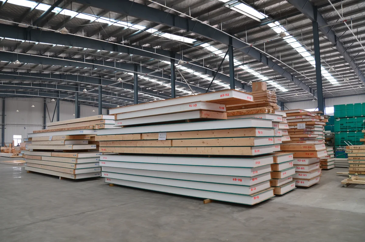 Prepared SIP panels stacked in the production hall.