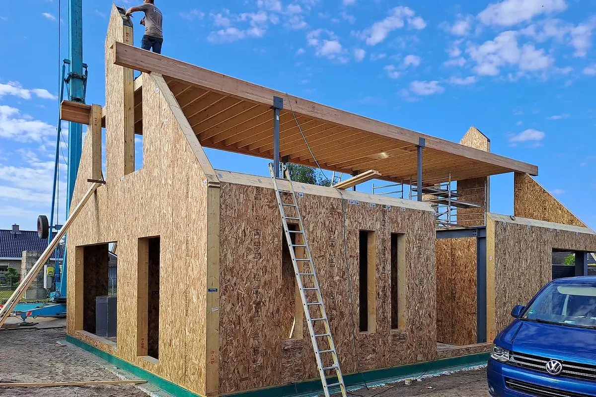SIP shell with opening geometry, timber supports and temporary bracing.