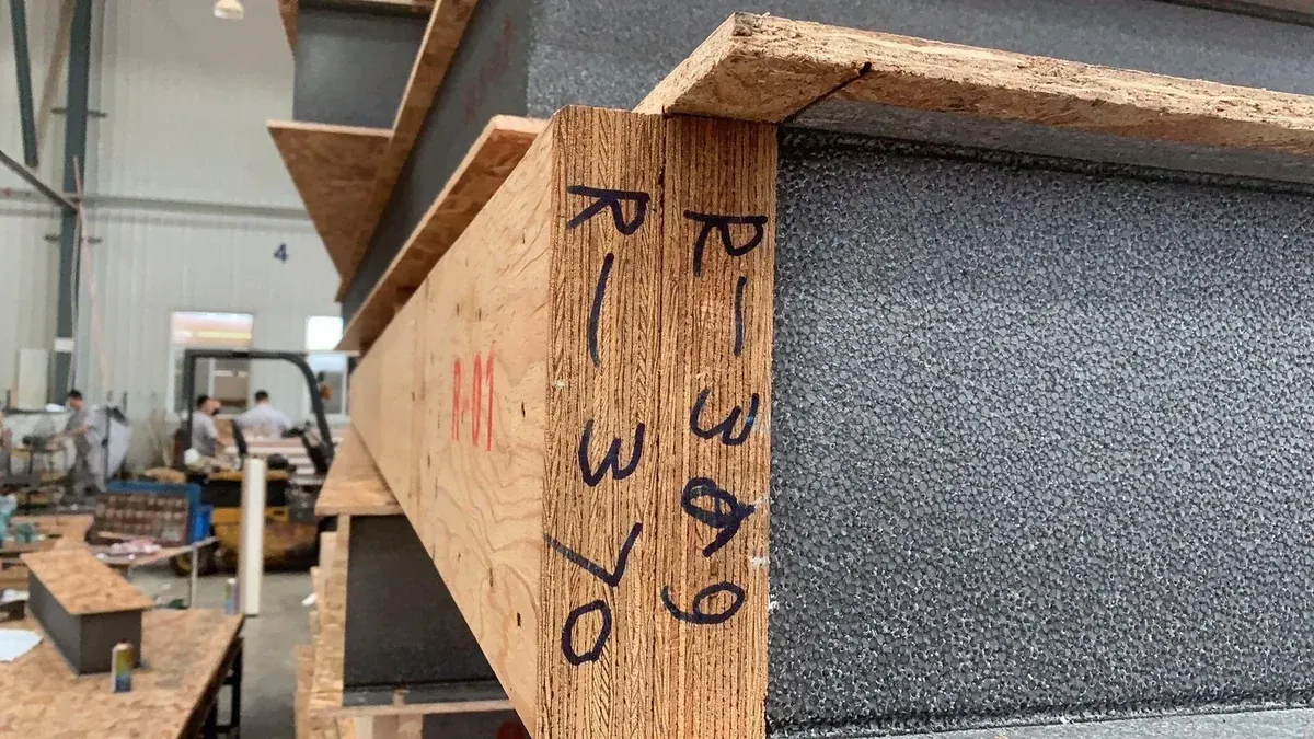 OSB faces and insulation core of an identified SIP element.