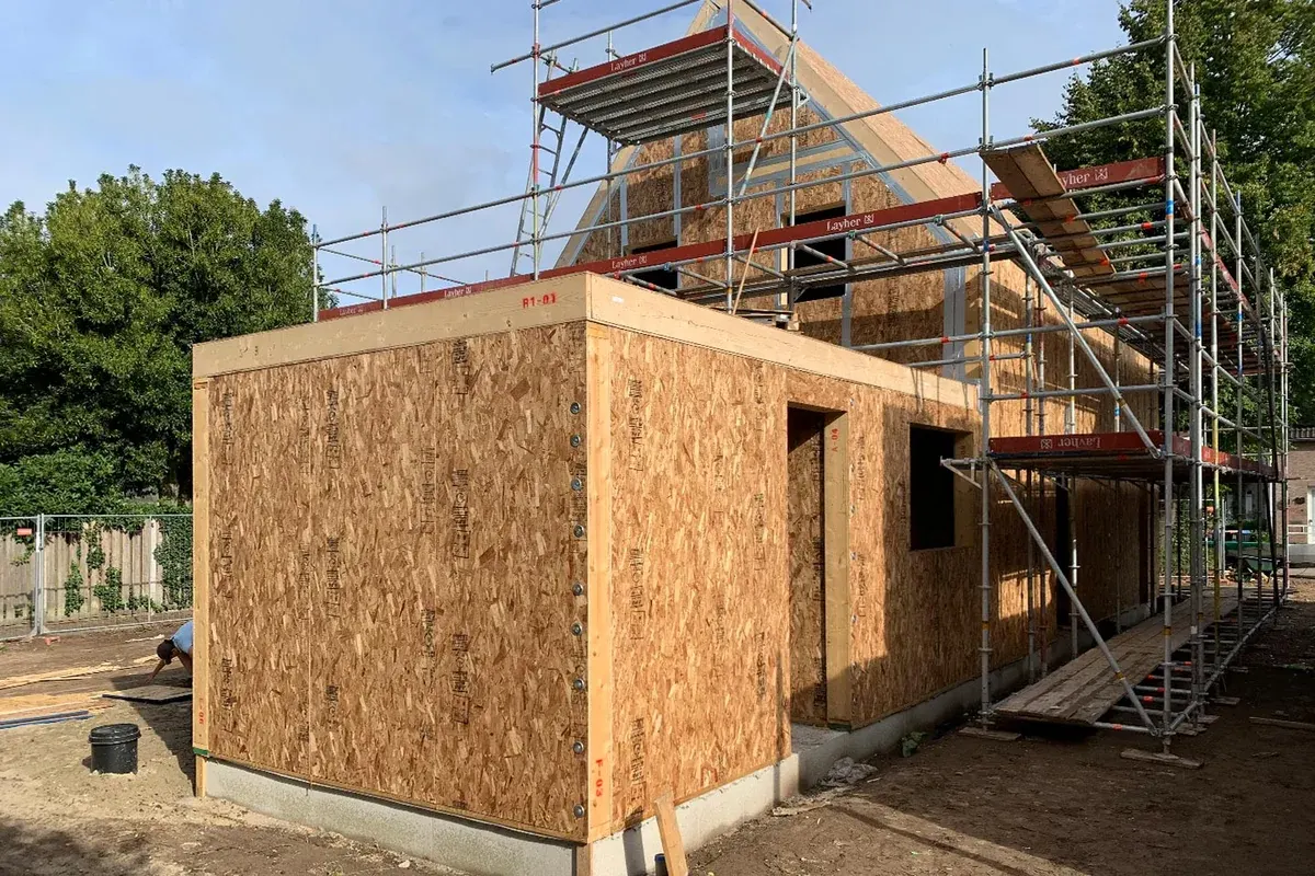 SIP shell, scaffolding and roof structure during site works.